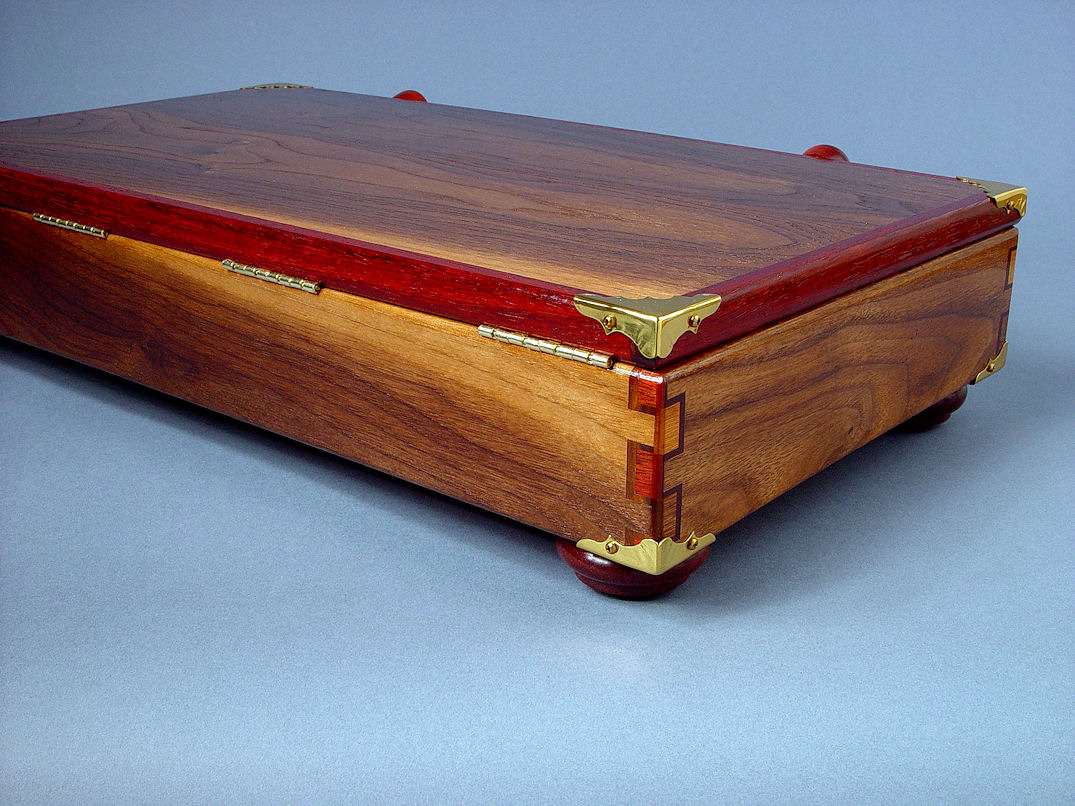 "Duhovni Ratnik" case back view. Case has brass stopped hinges, lid banding of Paduk hardwood and black walnut throughout