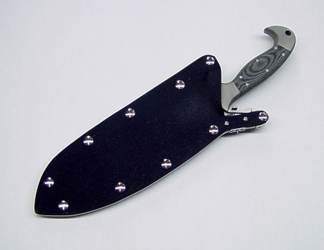 "Horrocks" tactical combat knife locked into waterproof sheath