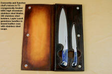 Open Book Case view of Concordia and Sanchez Custom Chef's Knives in T3 cryogenically treated 440C high chromium stainless steel blades, 304 stainless steel bolsters, Lapis Lazuli gemstone handles, book case in top grain leather, leather shoulder and belly, hand-carved, stainless steel snaps