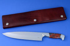 "Concordia" fine master chef's knife, obverse side view in CPM154CM high molybdenum powder metal technology tool steel blade, 304 stainless steel bolsters, Brecciated African Jasper gemstone handle, chef's roll case in latigo side leather and leather shoulder, hand-tooled, hand stitched with stainless steel snaps